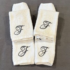 White Monogrammed Hand Towels featuring a bold F.